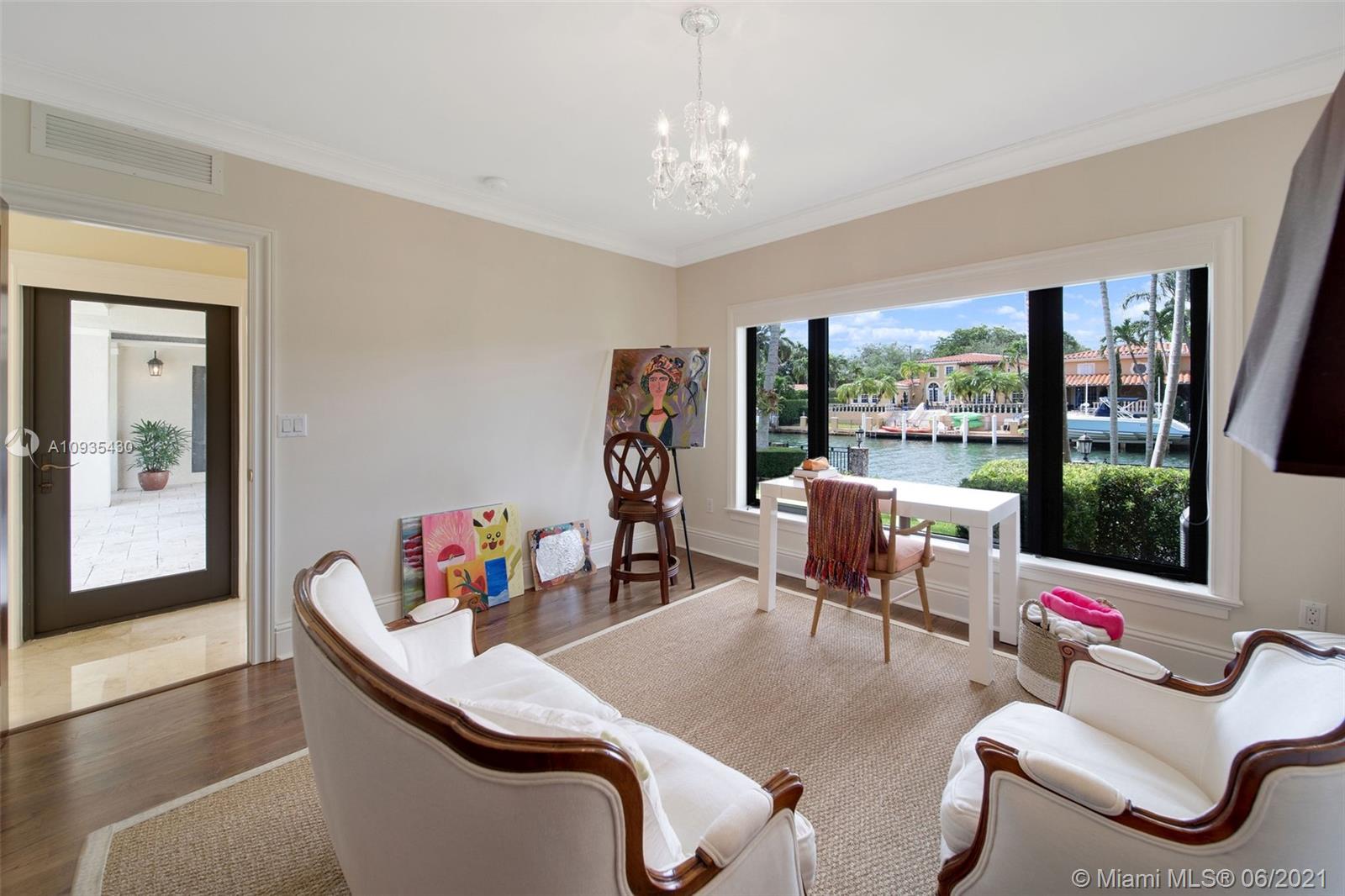 4804 Biltmore Drive Coral Gables, FL 33146 - Photo 24 of 47 a dining room with furniture and a floor to ceiling window