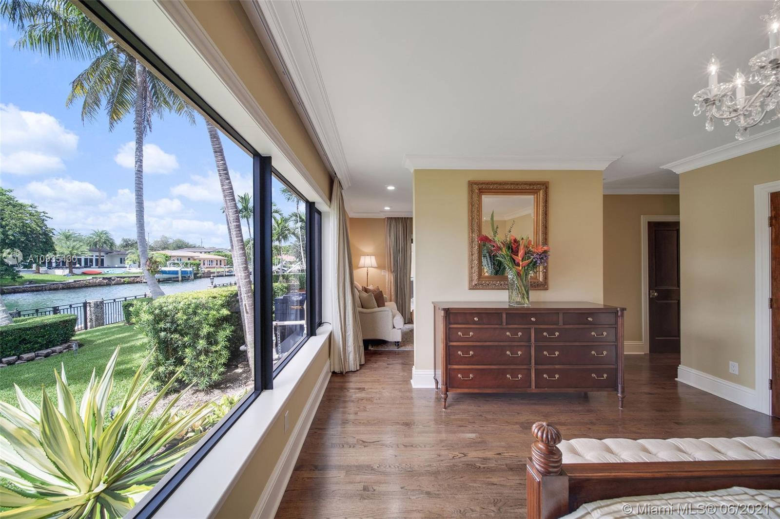 4804 Biltmore Drive Coral Gables, FL 33146 - Photo 31 of 47 a view of living room with furniture and a floor to ceiling window