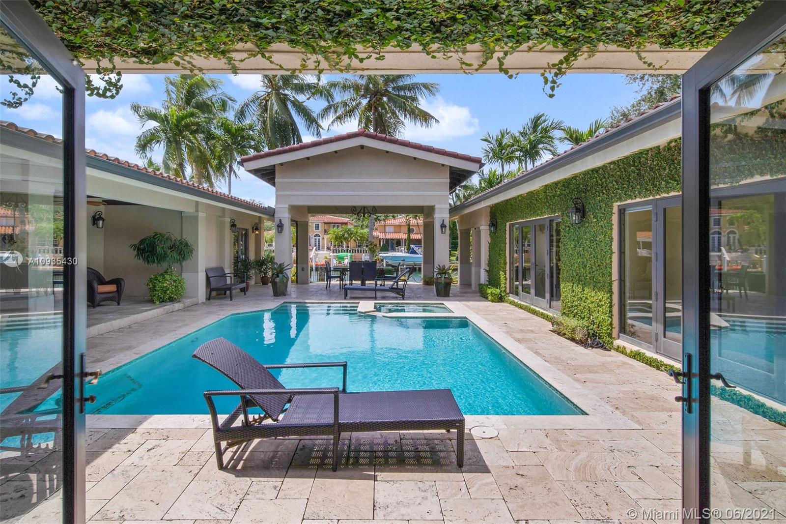 4804 Biltmore Drive Coral Gables, FL 33146 - Photo 35 of 47 a swimming pool with outdoor seating and yard