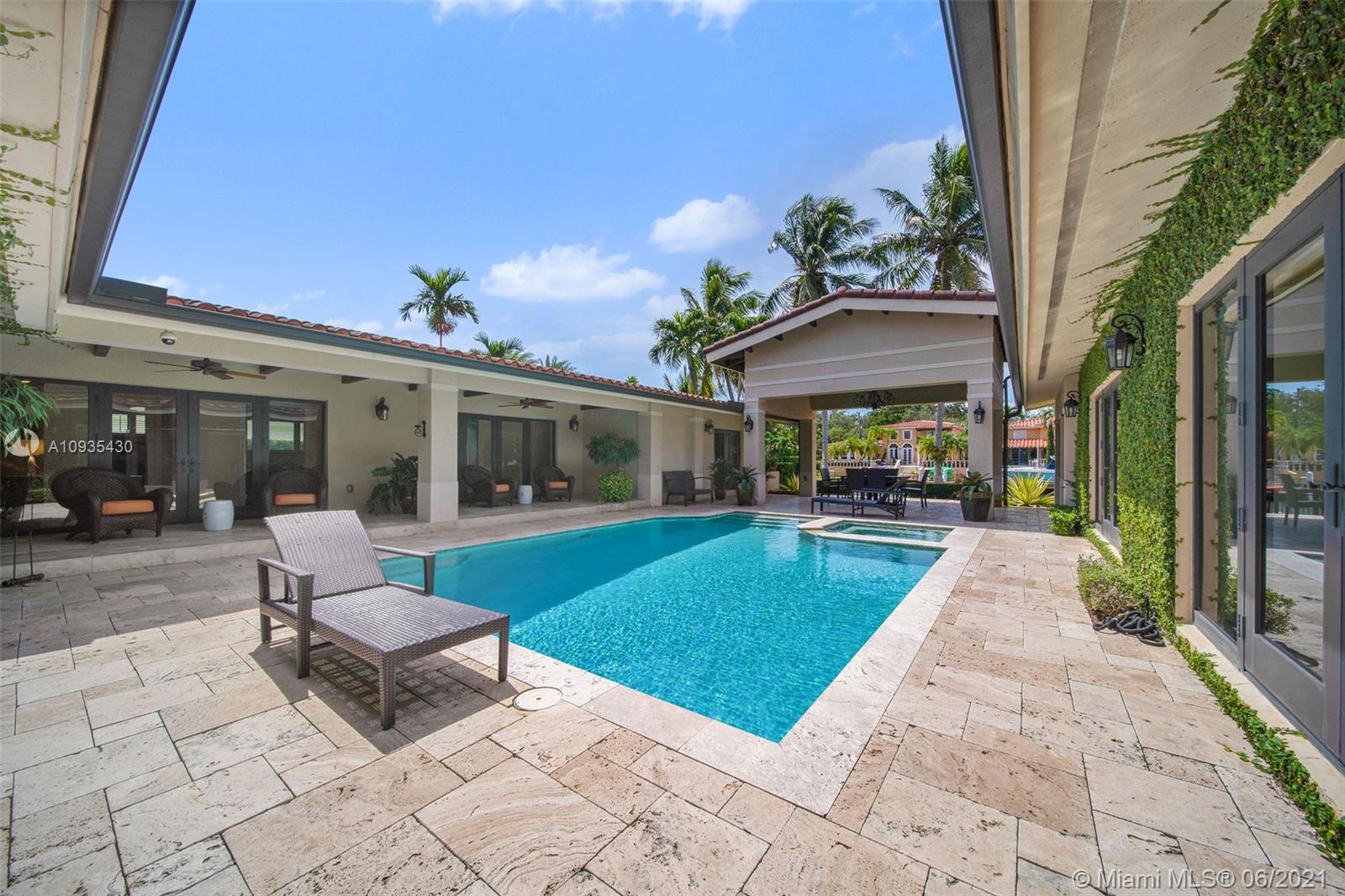4804 Biltmore Drive Coral Gables, FL 33146 - Photo 36 of 47 a view of a house with backyard porch and patio