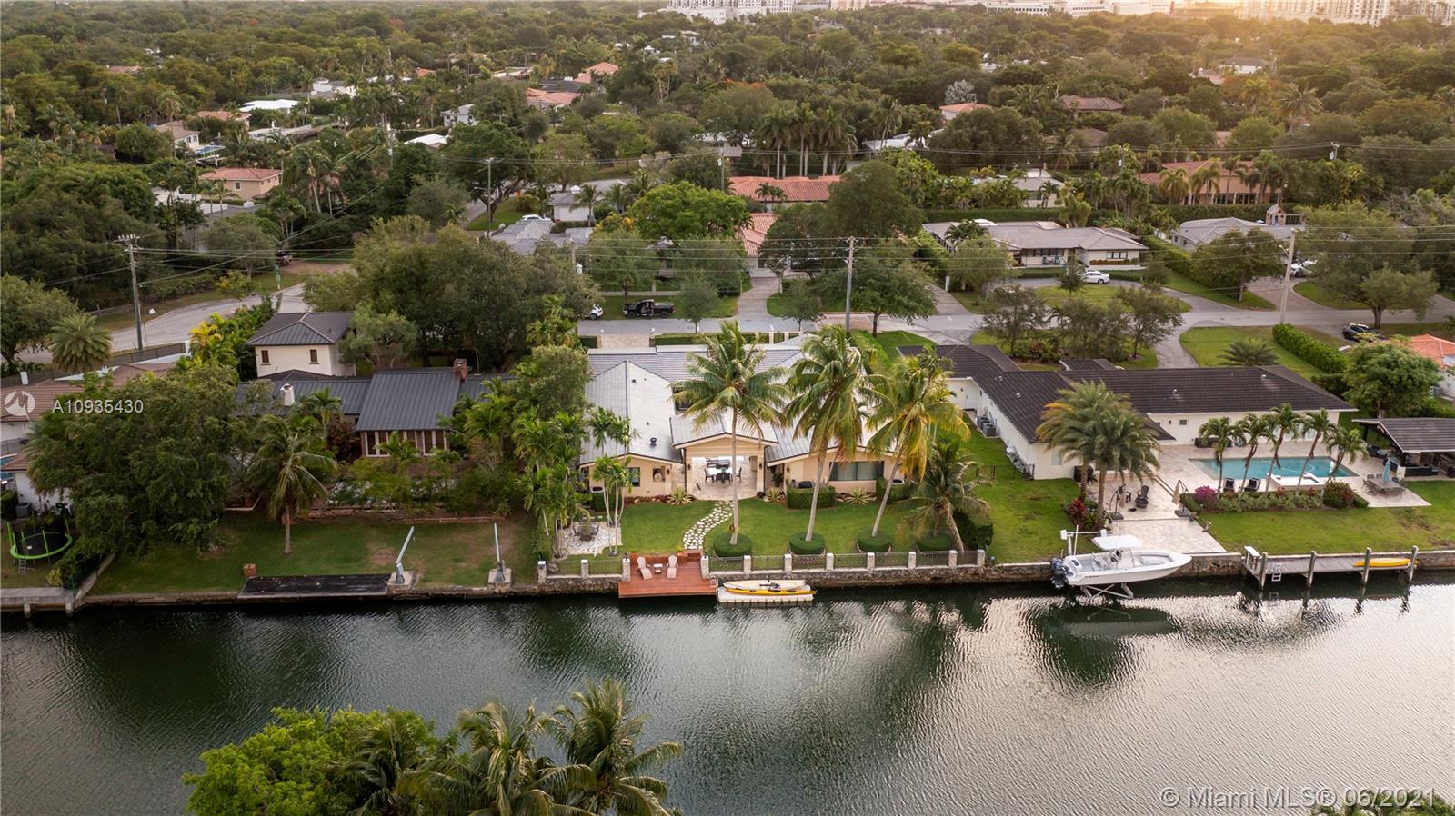 4804 Biltmore Drive Coral Gables, FL 33146 - Photo 46 of 47 an aerial view of residential houses with outdoor space and lake view