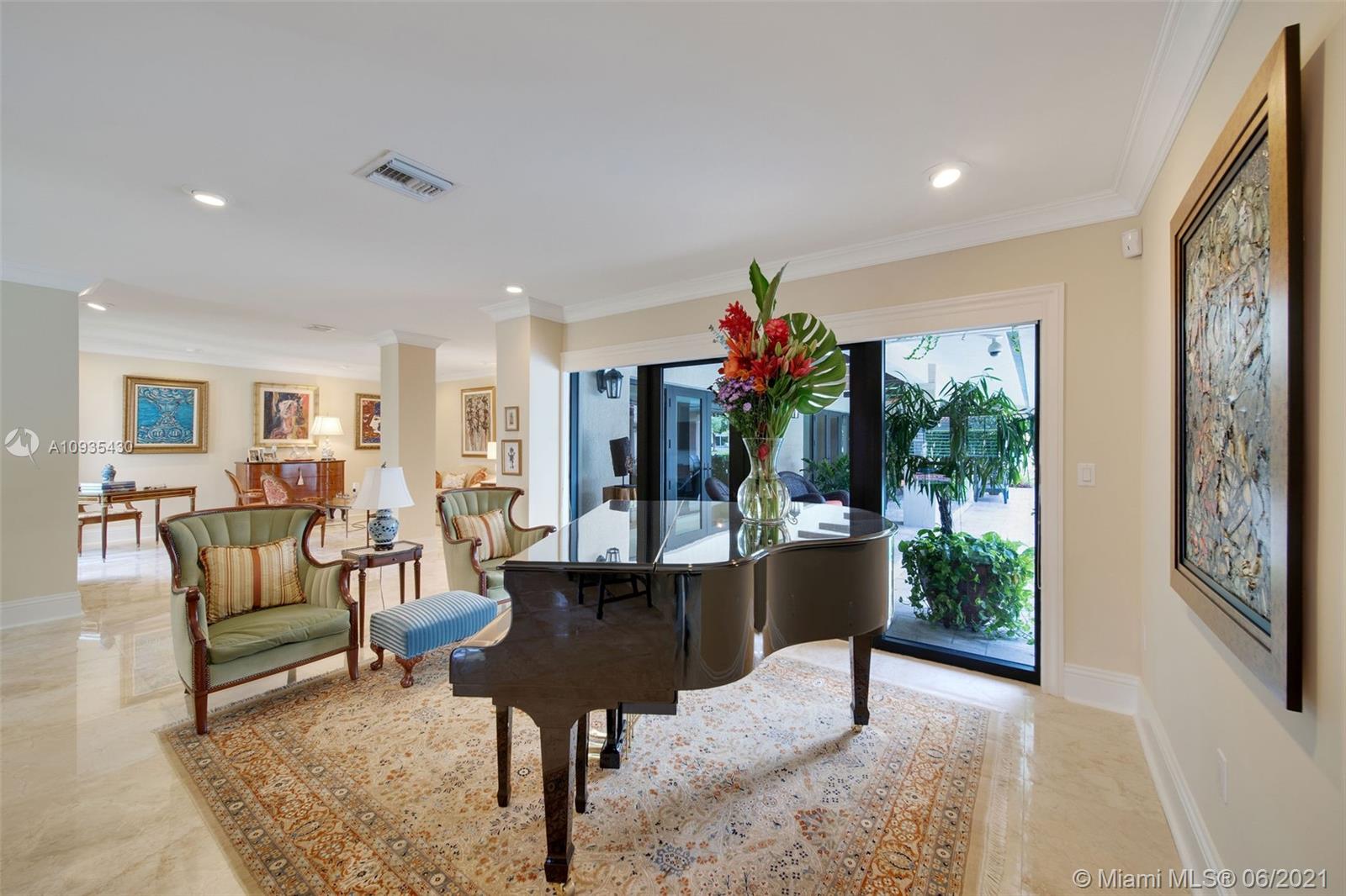 4804 Biltmore Drive Coral Gables, FL 33146 - Photo 8 of 47 a living room with furniture and a potted plant