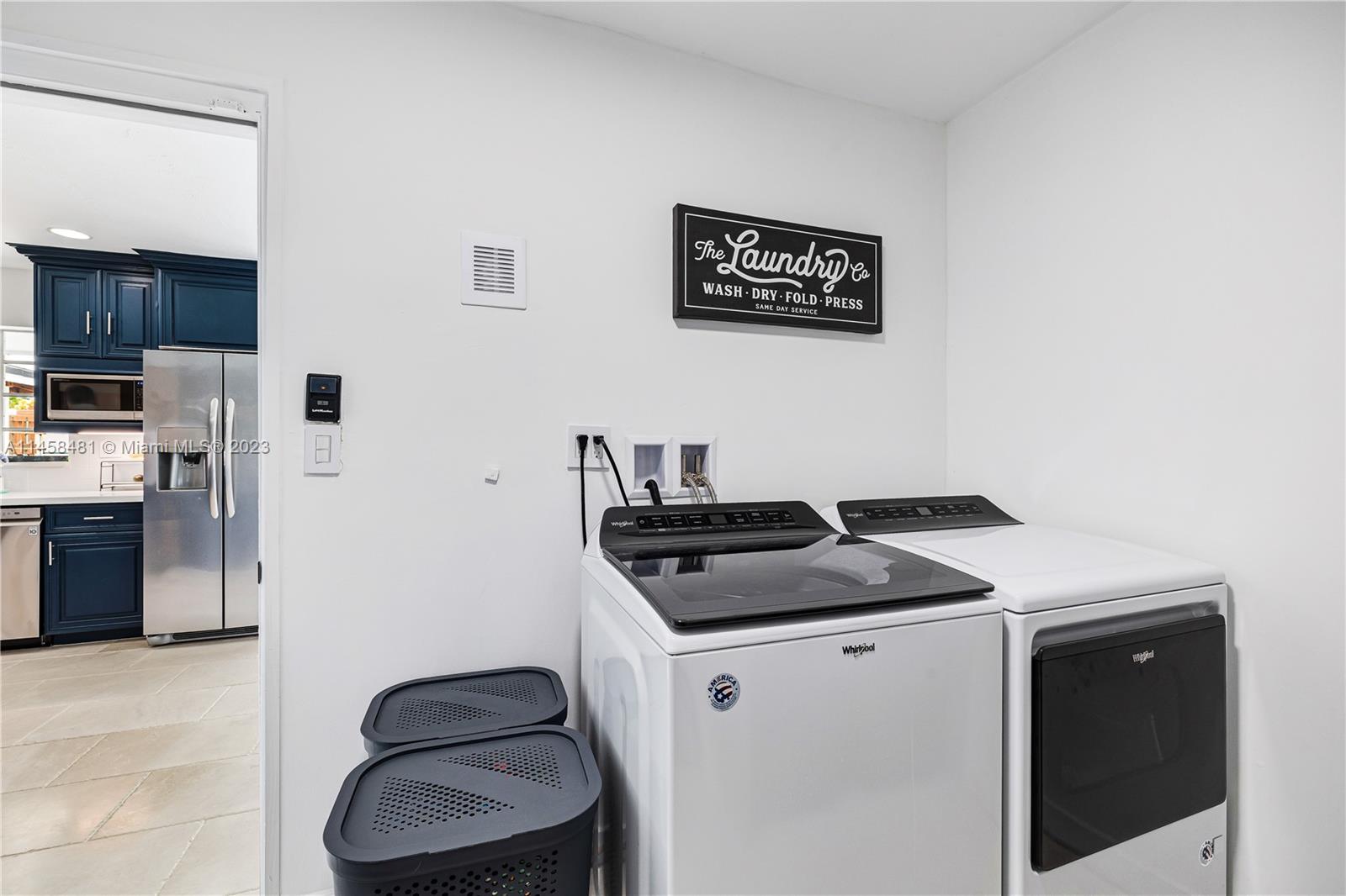 10520 Southwest 103rd Avenue Miami, FL 33176 - Photo 17 of 51 a kitchen with stainless steel appliances granite countertop a stove and a refrigerator