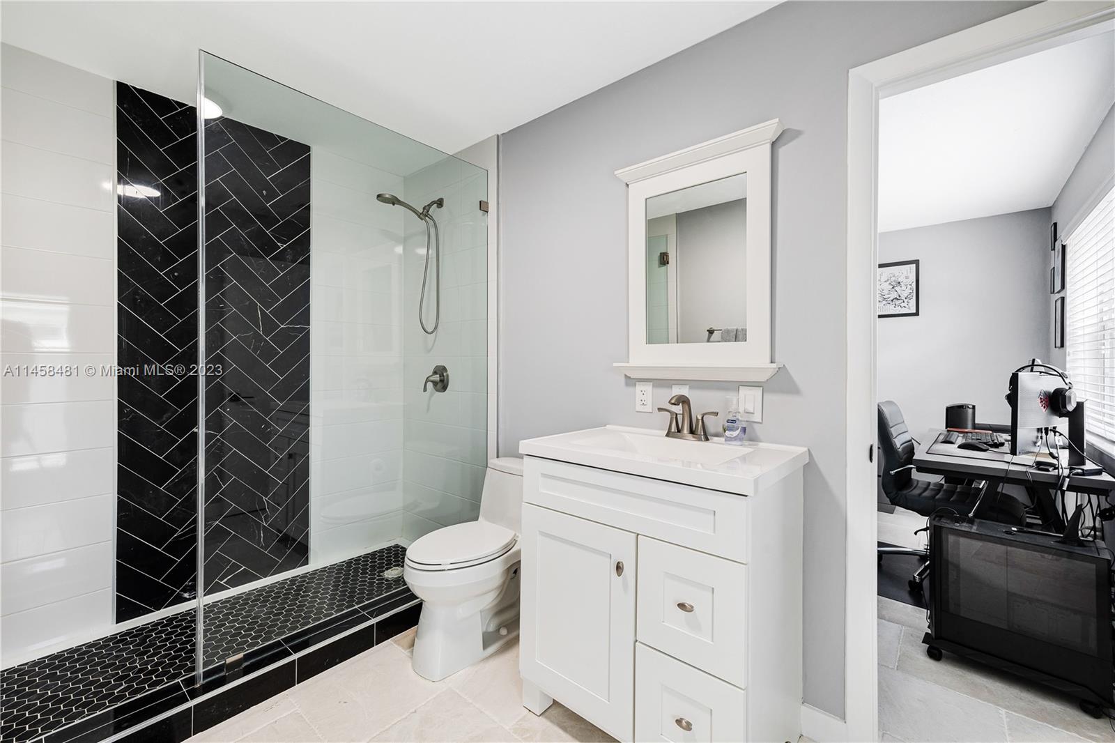 10520 Southwest 103rd Avenue Miami, FL 33176 - Photo 19 of 51 a bathroom with a sink a toilet and shower