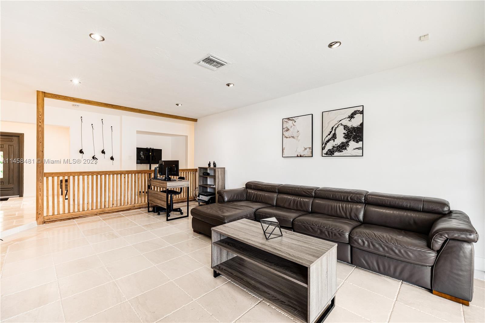 10520 Southwest 103rd Avenue Miami, FL 33176 - Photo 22 of 51 a living room with furniture and a large window