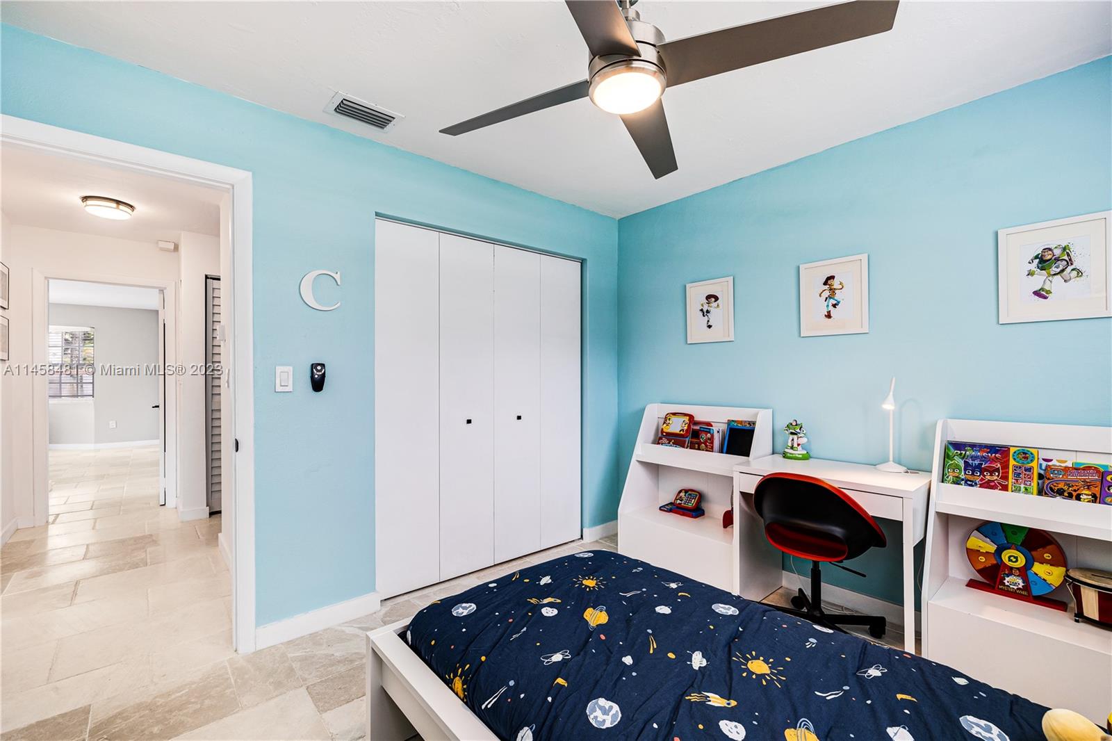 10520 Southwest 103rd Avenue Miami, FL 33176 - Photo 25 of 51 a room with furniture and a book shelf