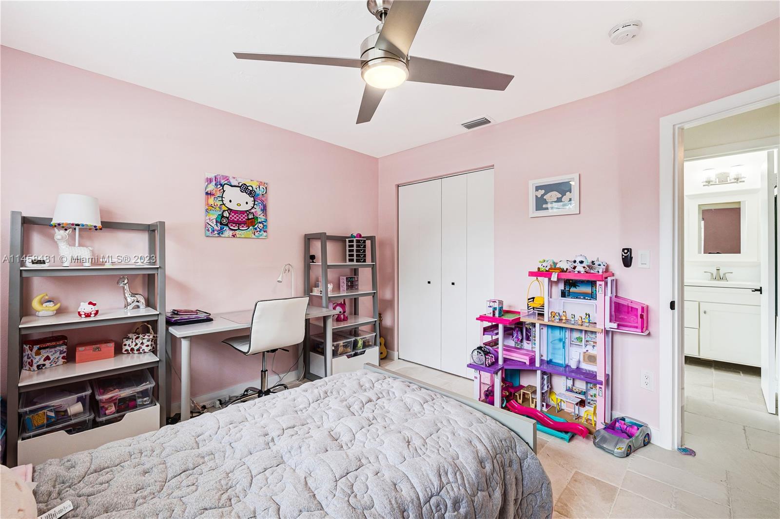 10520 Southwest 103rd Avenue Miami, FL 33176 - Photo 28 of 51 a bed room with a bed and a desk