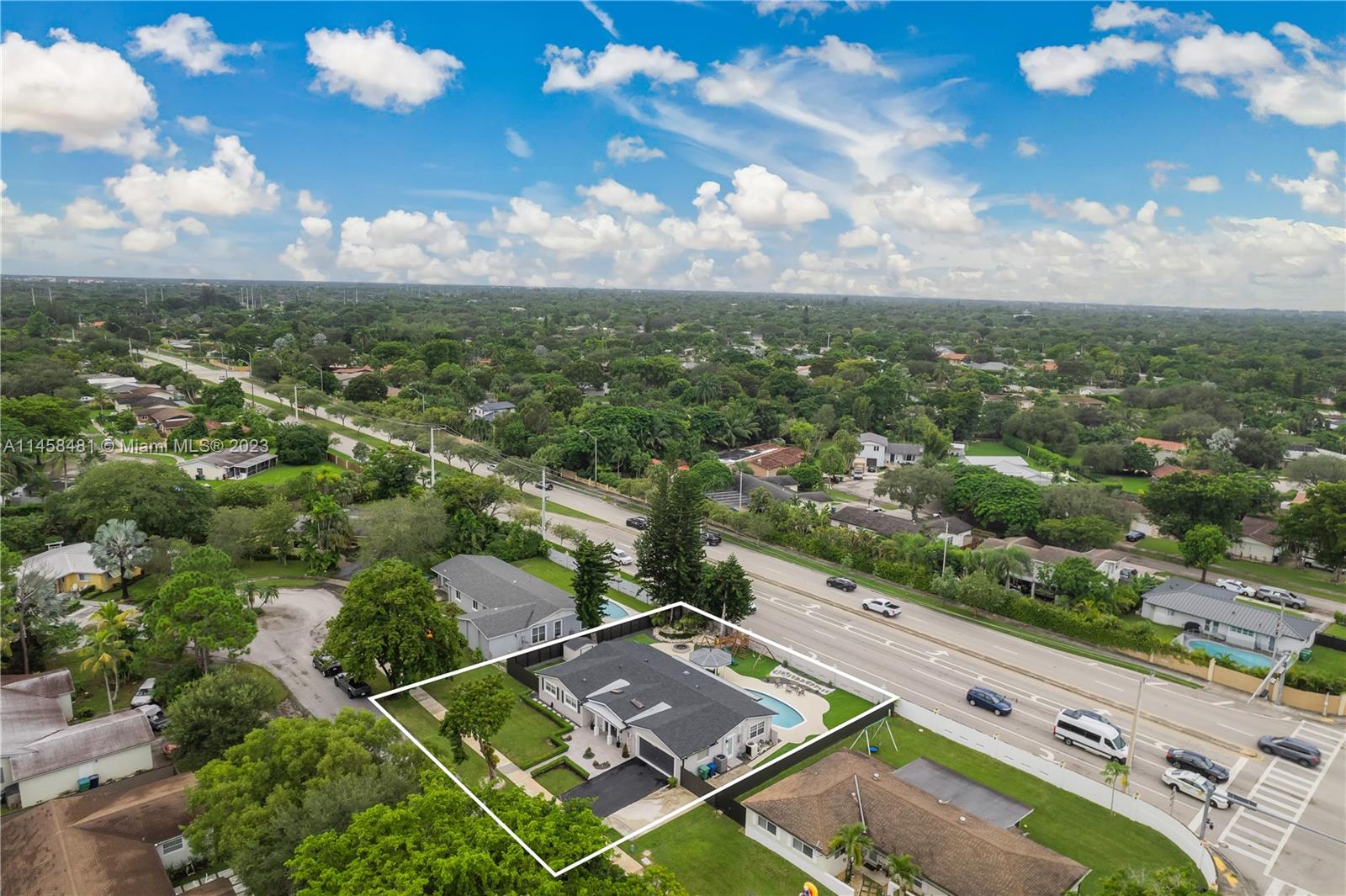 10520 Southwest 103rd Avenue Miami, FL 33176 - Photo 7 of 51 an aerial view of residential houses with outdoor space