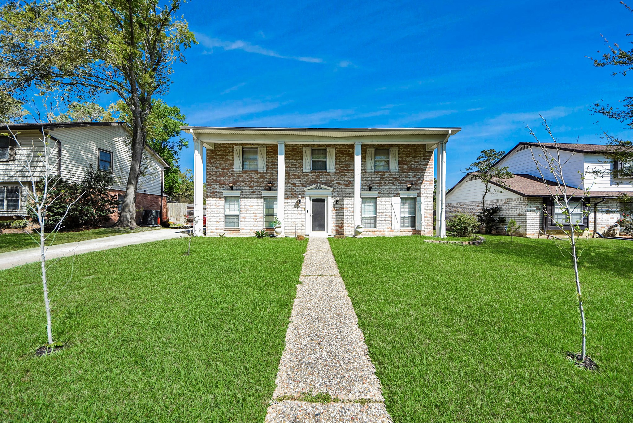 1011 Whitestone Lane Houston, TX 77073 - Photo 2 of 48 a view of a house with garden