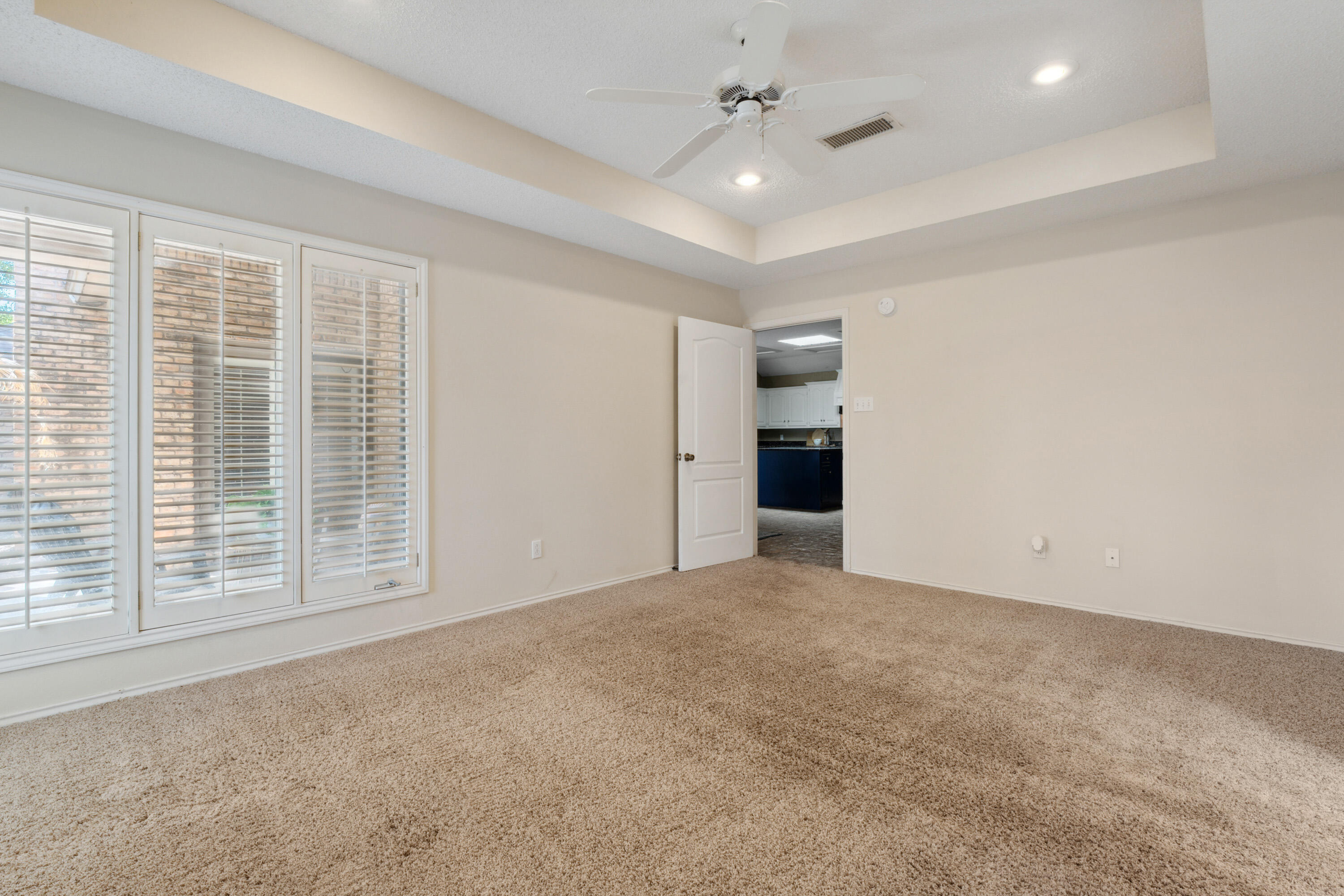 102 North Utica Avenue Lubbock, TX 79416 - Photo 18 of 36 a view of an empty room with a window