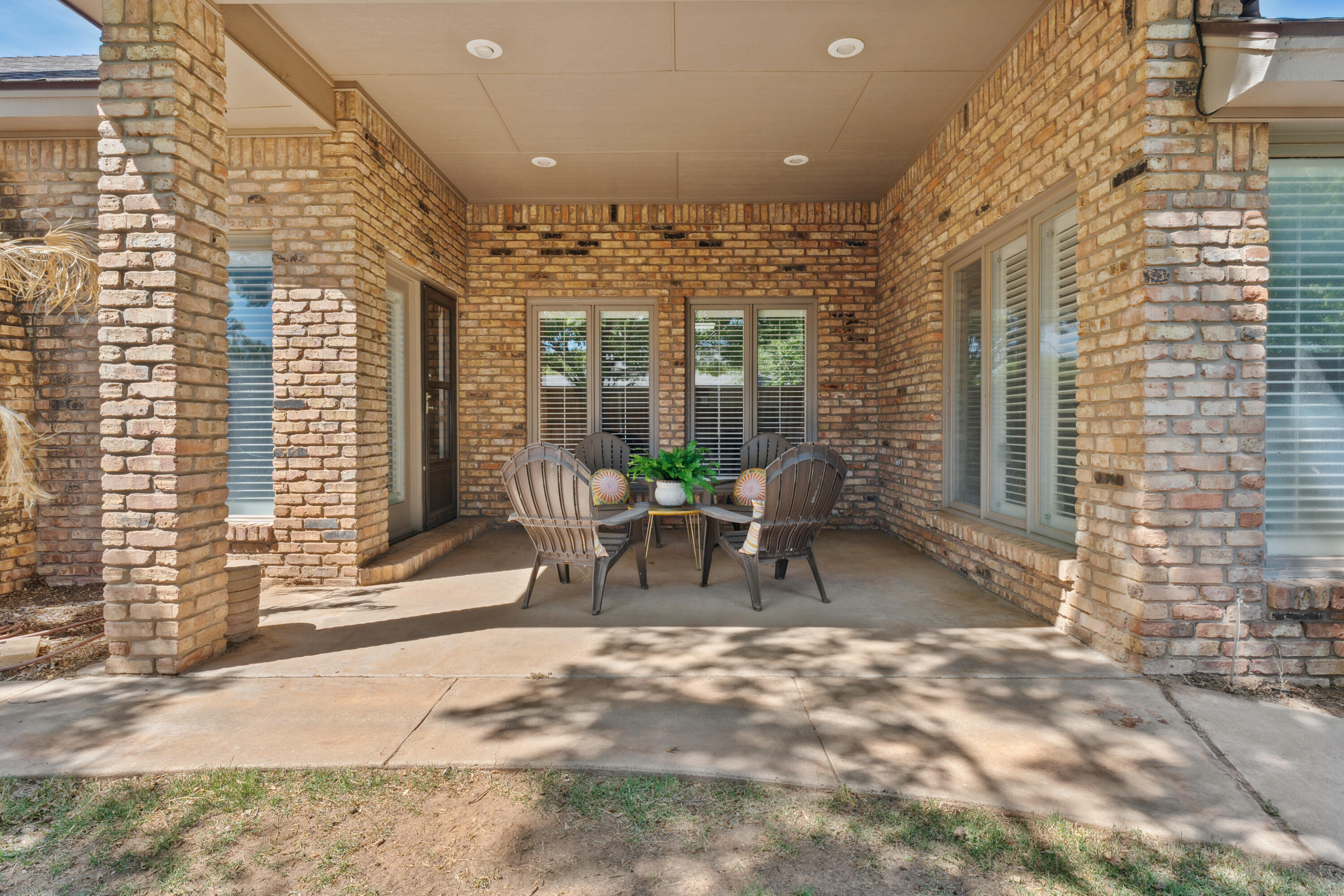 102 North Utica Avenue Lubbock, TX 79416 - Photo 33 of 36 a view of a building with outdoor seating