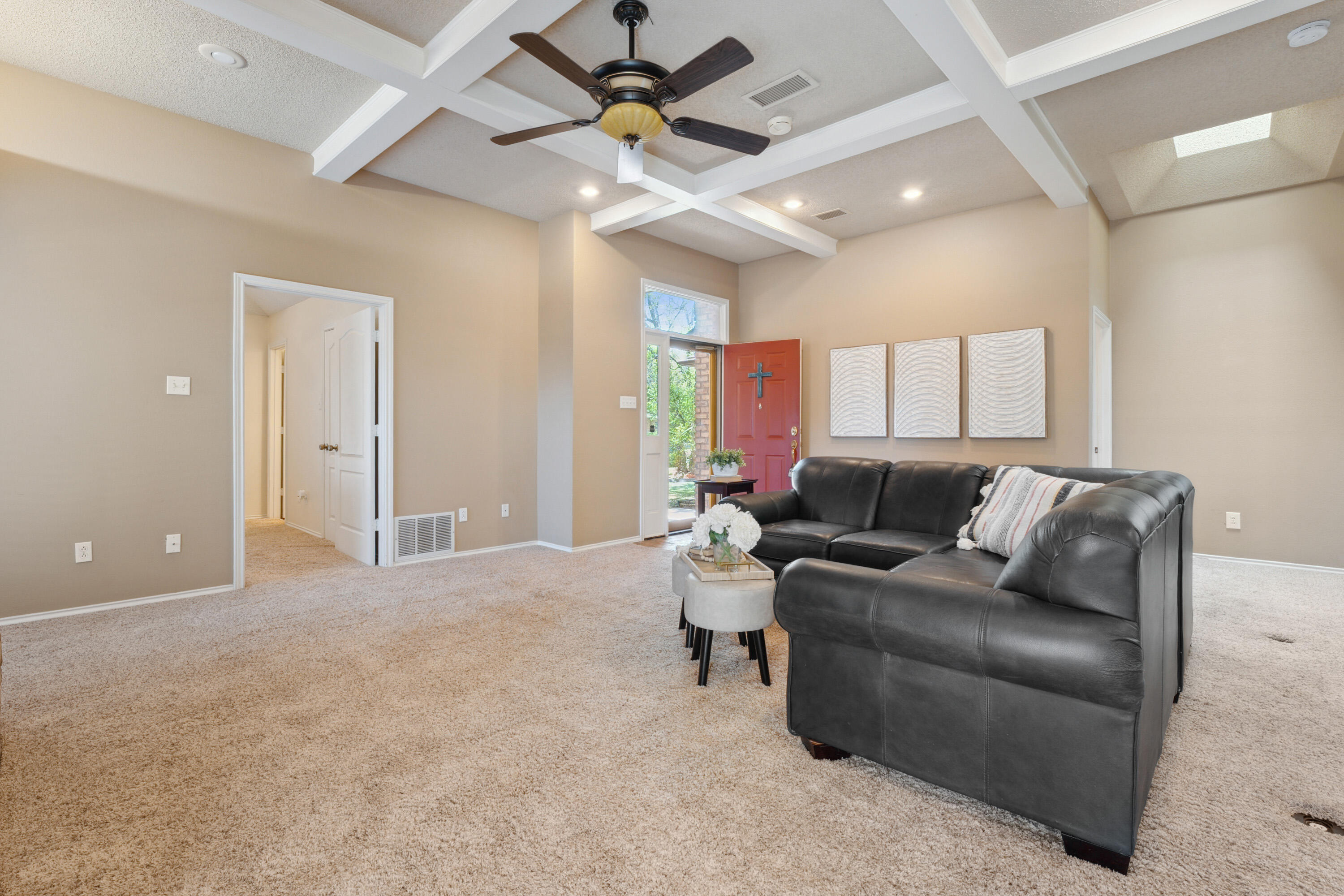 102 North Utica Avenue Lubbock, TX 79416 - Photo 8 of 36 a living room with furniture and a ceiling fan