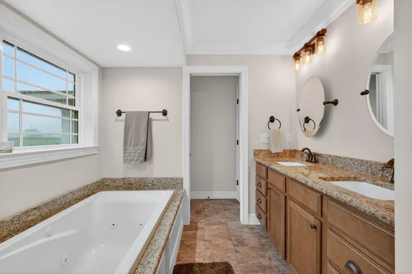 a bathroom with a sink a toilet and a bathtub