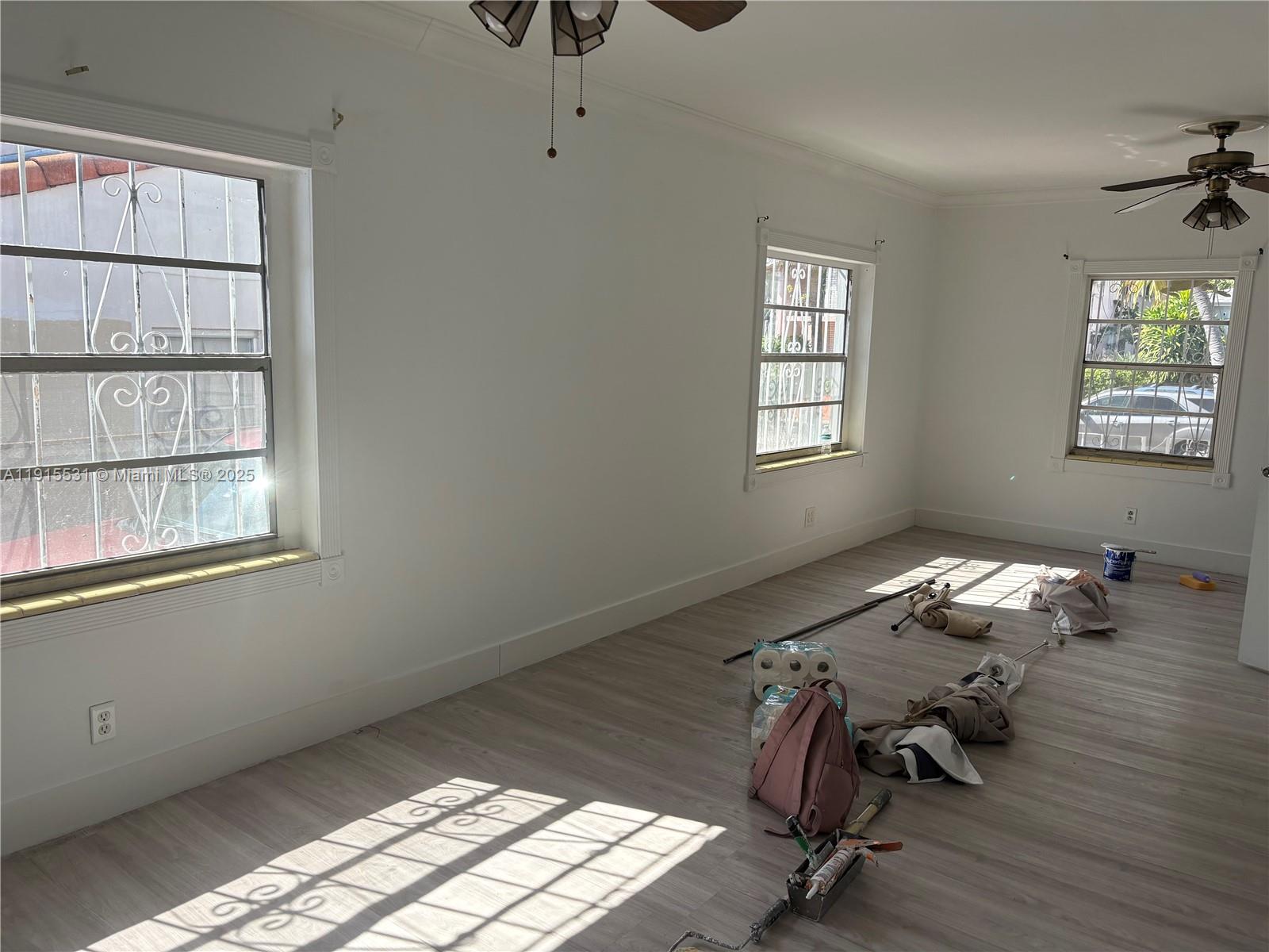 927 Southwest 9th Avenue, Unit 1 Miami, FL 33130 - Photo 16 of 16 a room with gym equipment and a window