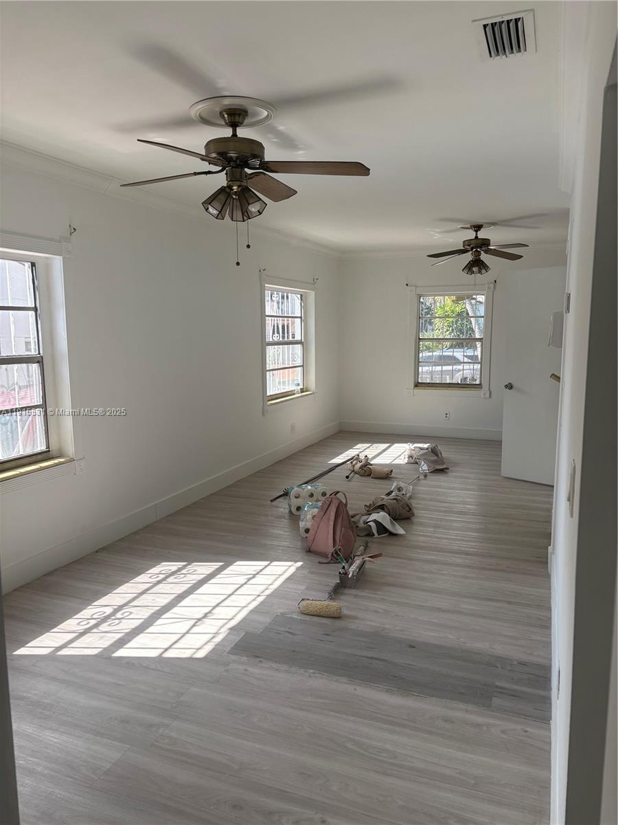 927 Southwest 9th Avenue, Unit 1 Miami, FL 33130 - Photo 6 of 16 a living room with couch and a window