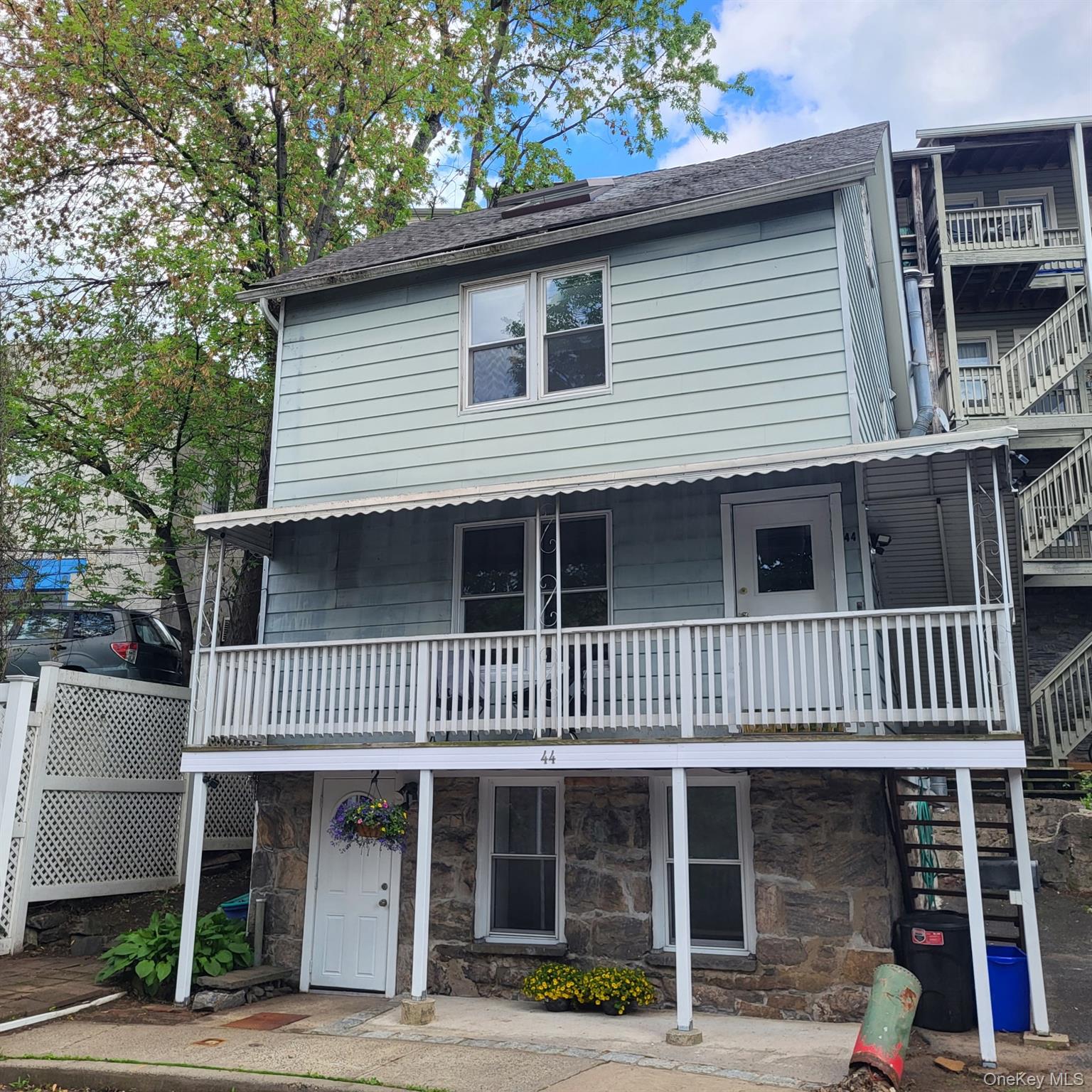 44 Ridge Street, Unit 2 Hastings-on-Hudson, NY 10706 - Photo 1 of 16 View of front of property featuring stairway and stone siding