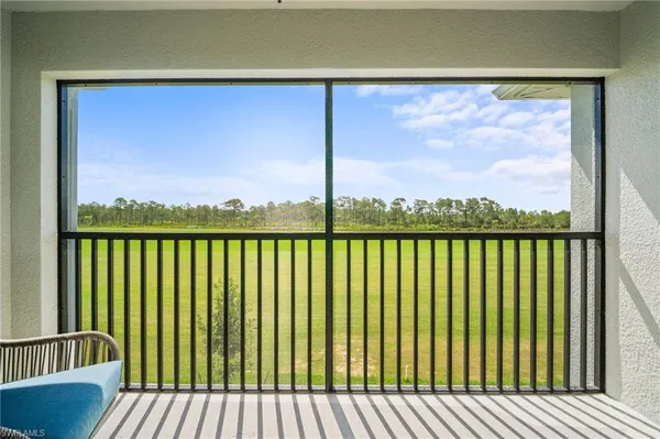 a balcony view with a lake view