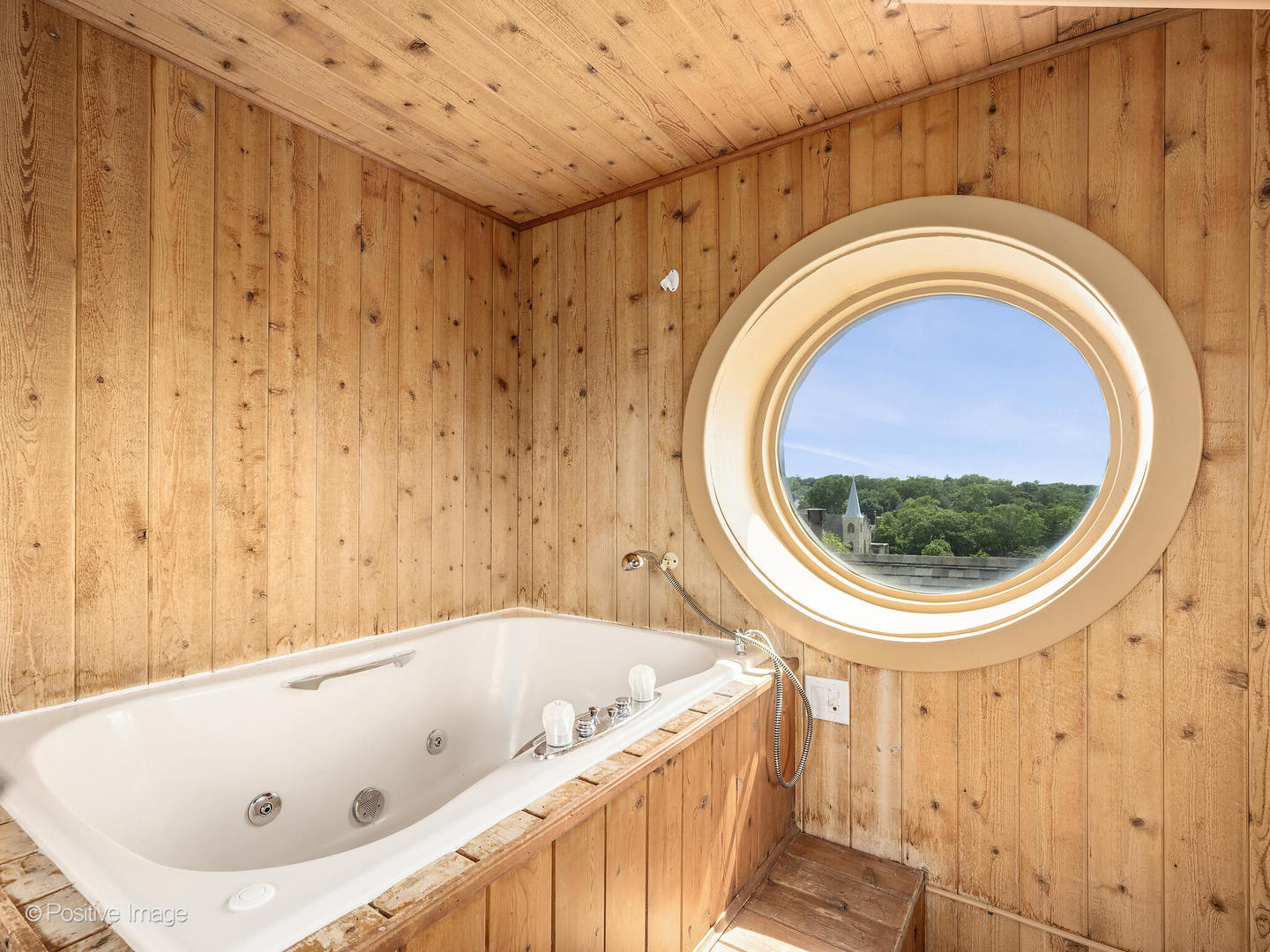 400 McCarthy Road, Unit 416 Lemont, IL 60439 - Photo 18 of 21 a bathroom with a bathtub and a window