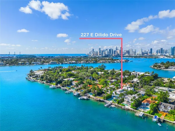 a dining room with a table and chairs