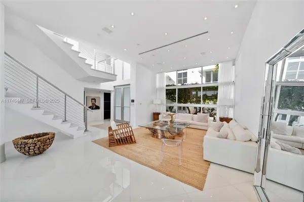 a bathroom with a bathtub and a sink