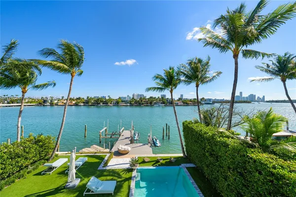 a bathroom with a shower and a sink