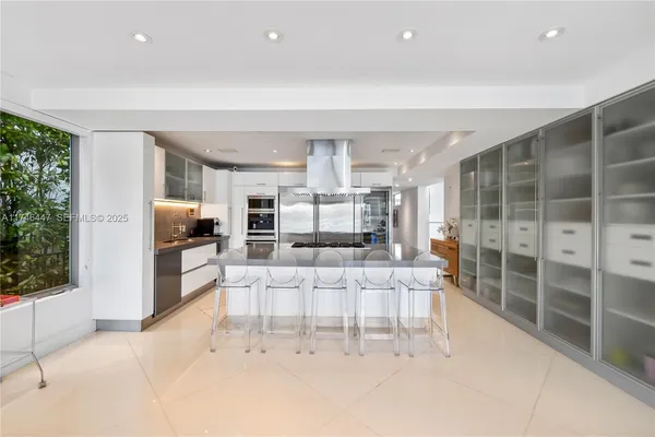 a view of a garden with lawn chairs