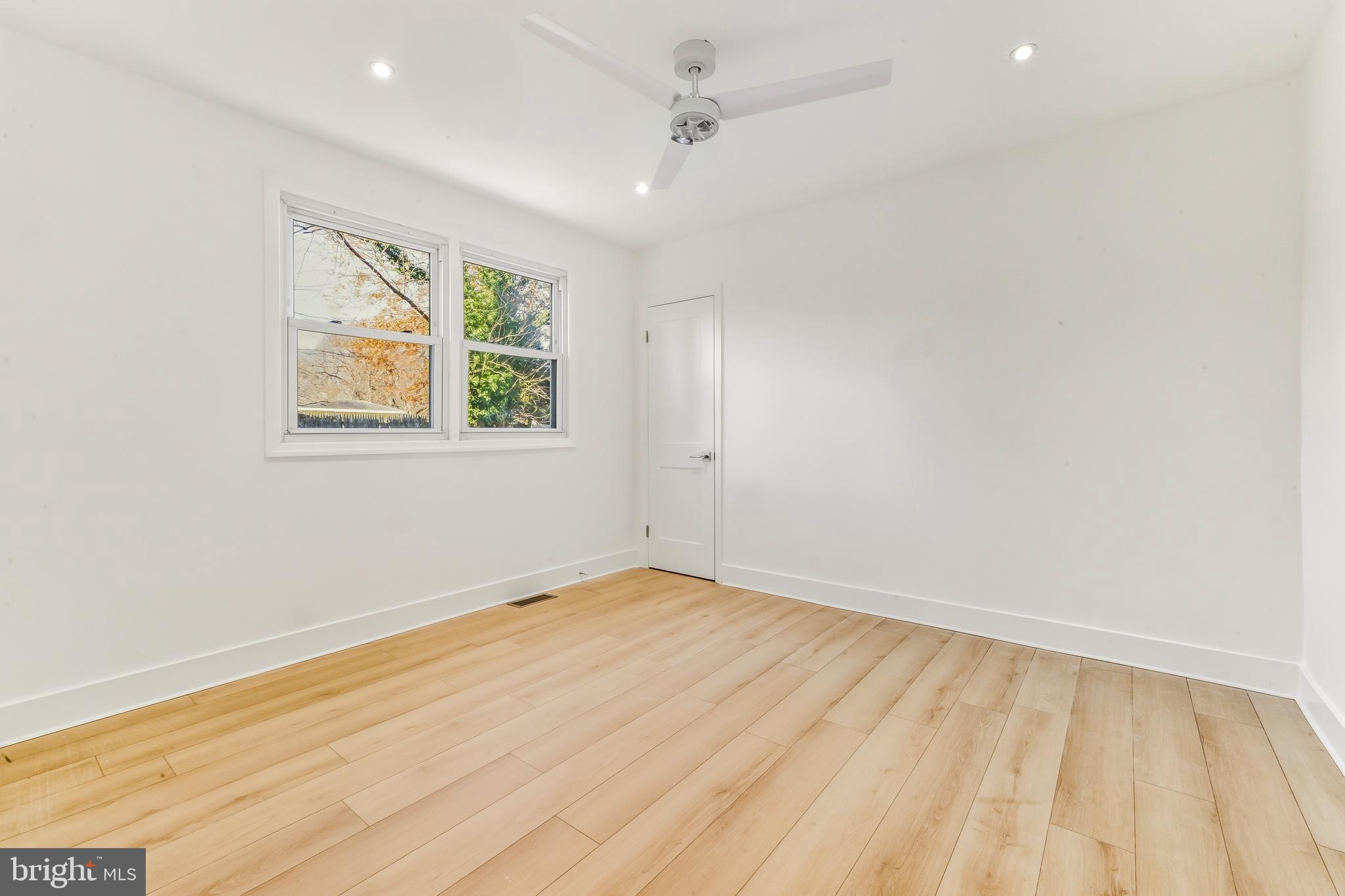 3 Farndale Road Somerdale, NJ 08083 - Photo 9 of 14 an empty room with a window and a ceiling fan