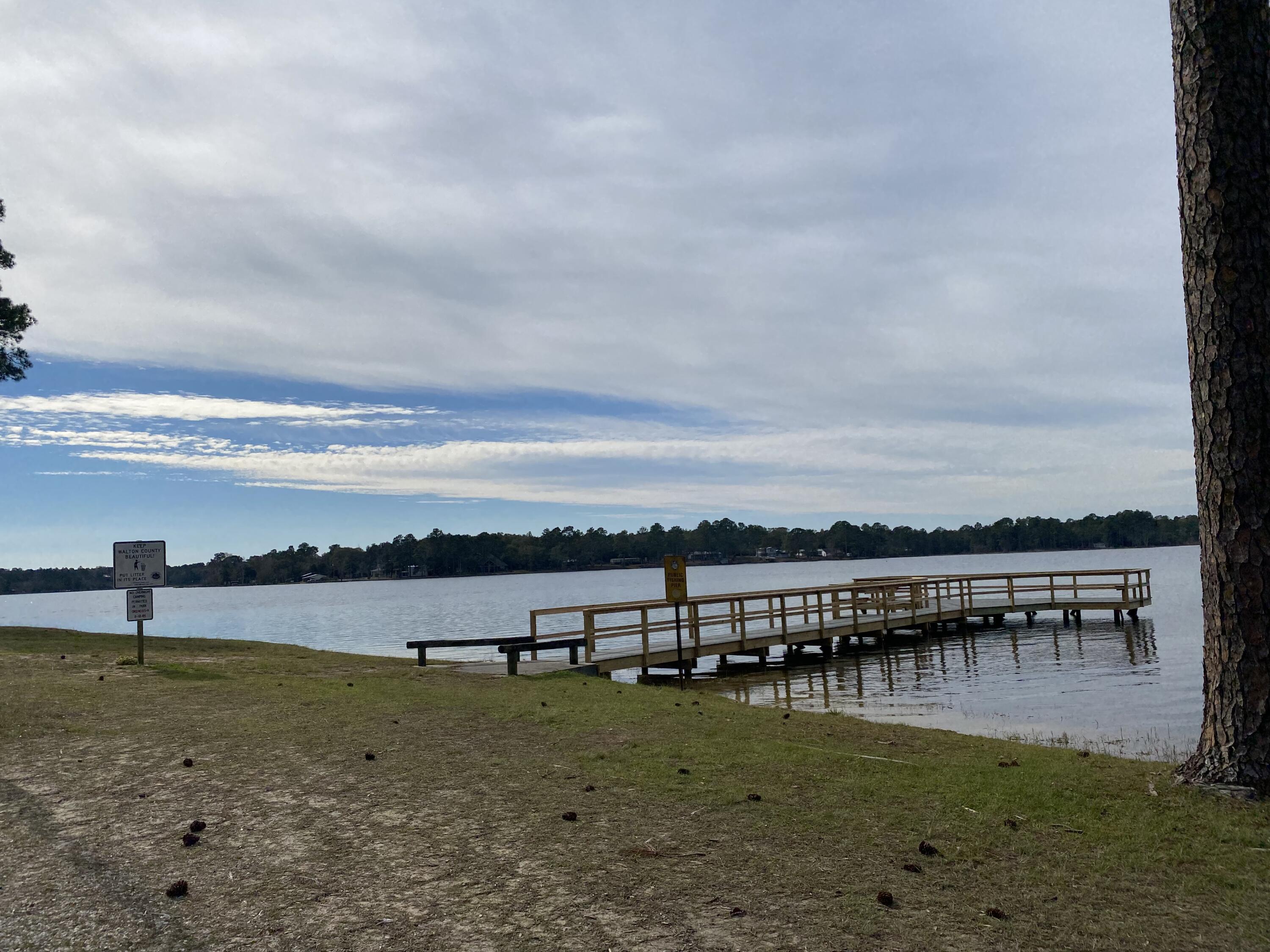Lot 4 Beasley Road DeFuniak Springs, FL 32433 - Photo 5 of 13 a view of swimming pool with outdoor seating and lake