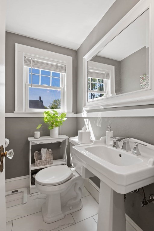 28 Columbia Road Marblehead, MA 01945 - Photo 26 of 42 a bathroom with a sink and a toilet