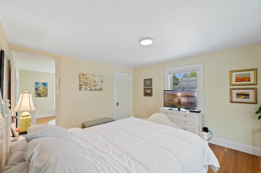 28 Columbia Road Marblehead, MA 01945 - Photo 32 of 42 a bedroom with a bed and a flat screen tv