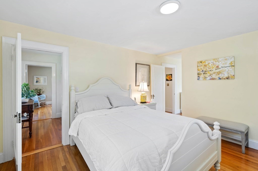 28 Columbia Road Marblehead, MA 01945 - Photo 33 of 42 a bedroom with a bed and a painting on the wall