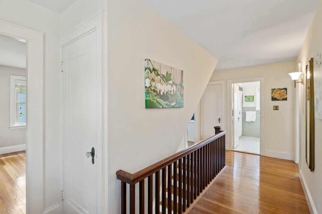 28 Columbia Road Marblehead, MA 01945 - Photo 34 of 42 a view of a hallway with wooden floor and windows