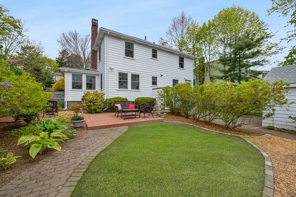 28 Columbia Road Marblehead, MA 01945 - Photo 5 of 42 a front view of a house with garden
