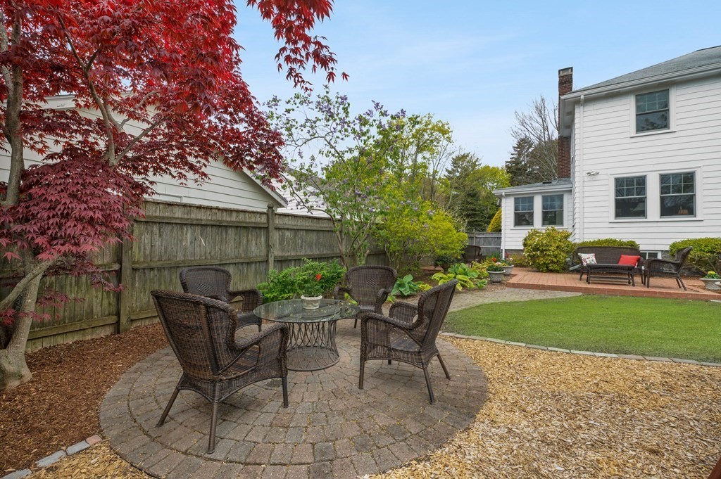 28 Columbia Road Marblehead, MA 01945 - Photo 9 of 42 a view of a house with backyard sitting area and garden