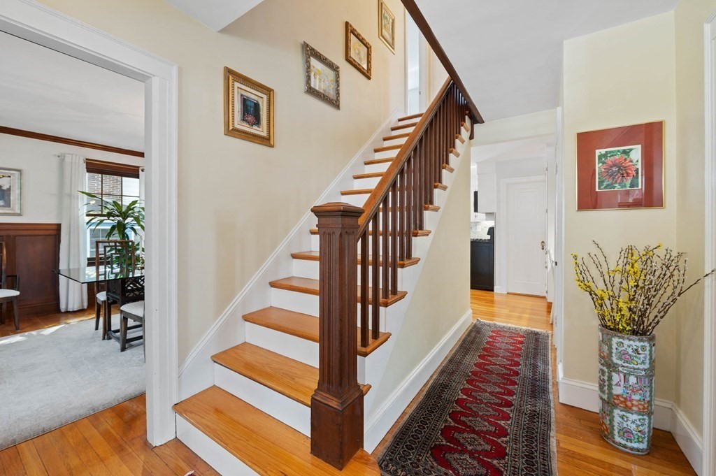 28 Columbia Road Marblehead, MA 01945 - Photo 10 of 42 a view of staircase with furniture and a potted plant