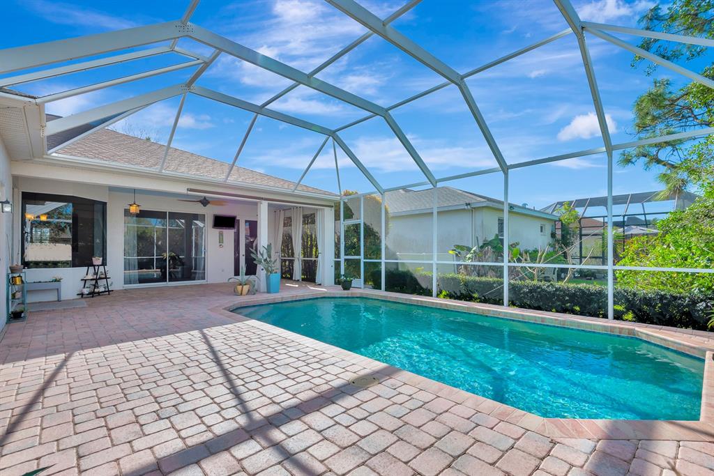 7344 Arrowhead Run Lakewood Ranch, FL 34202 - Photo 14 of 24 a view of a house with backyard and porch