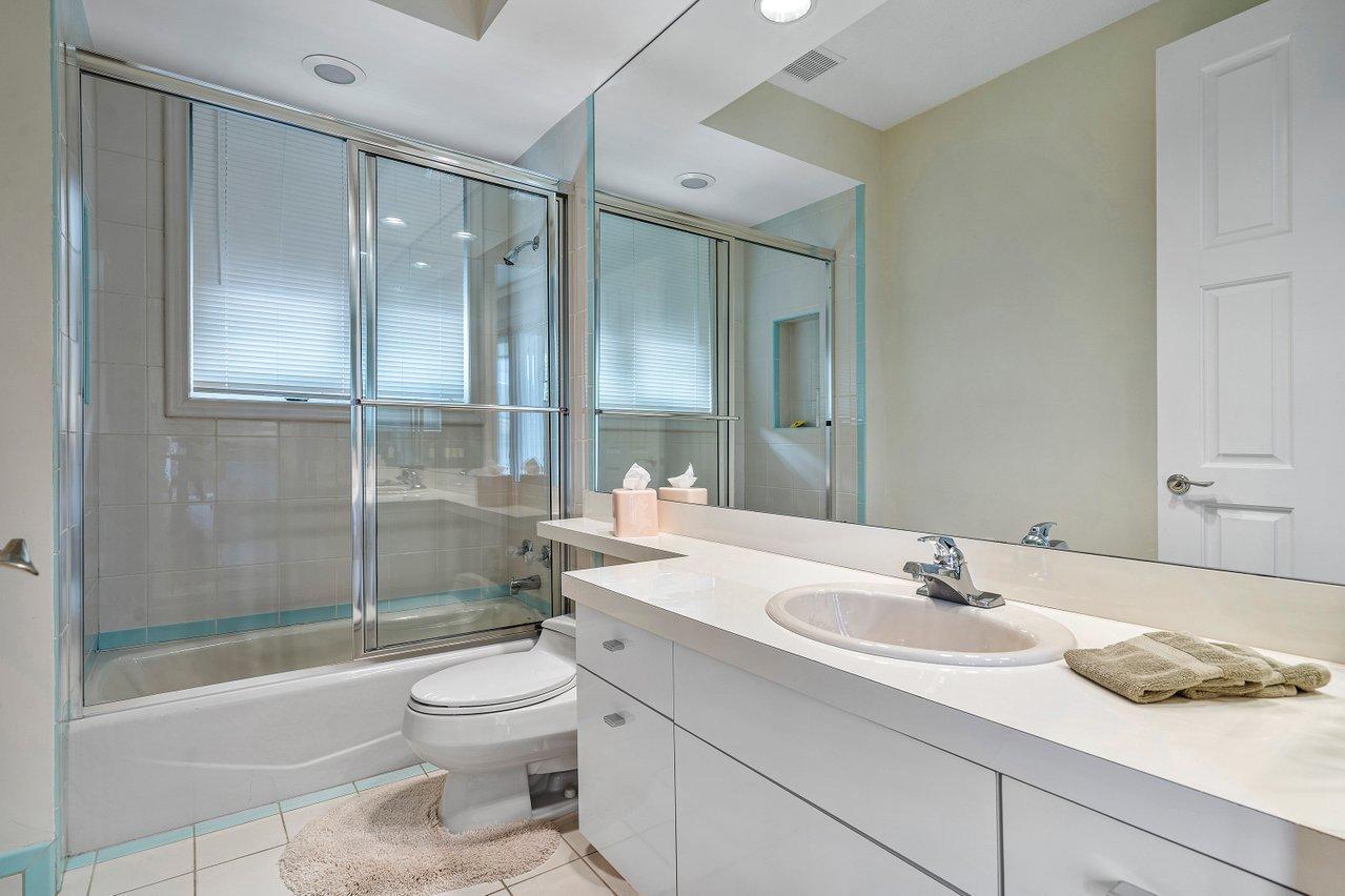 750 Tern Point Circle Boca Raton, FL 33431 - Photo 25 of 81 a bathroom with a sink toilet tub and shower