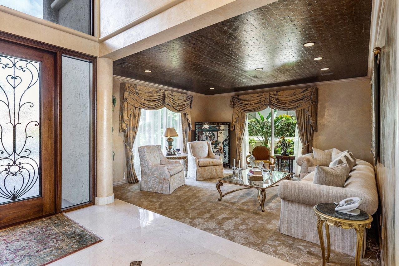750 Tern Point Circle Boca Raton, FL 33431 - Photo 3 of 81 a living room with furniture and a large window