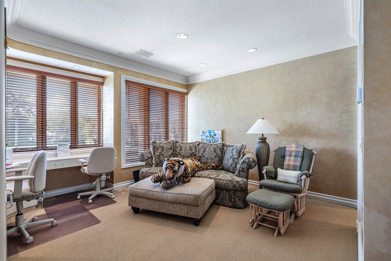 750 Tern Point Circle Boca Raton, FL 33431 - Photo 36 of 81 a living room with furniture and a large window