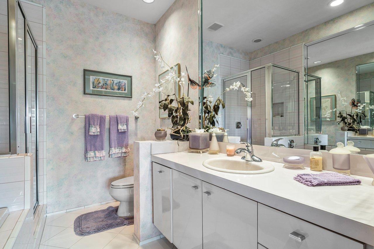 750 Tern Point Circle Boca Raton, FL 33431 - Photo 42 of 81 a bathroom with a granite countertop sink mirror vanity and toilet