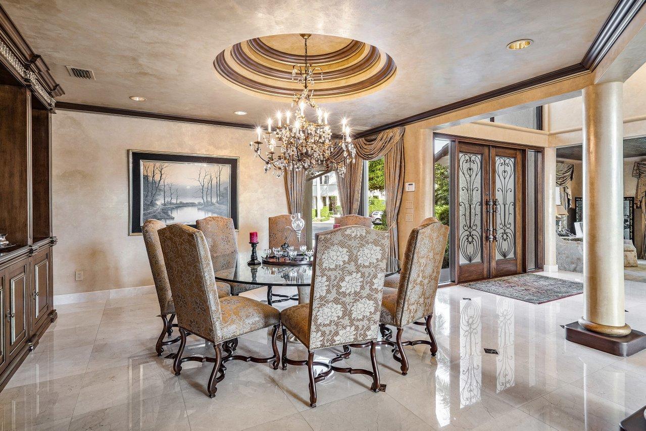 750 Tern Point Circle Boca Raton, FL 33431 - Photo 5 of 81 a dining room with furniture a livingroom and chandelier