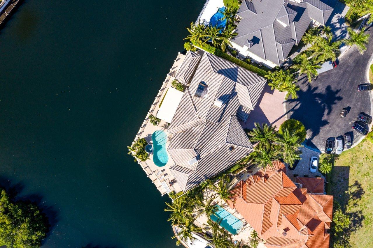750 Tern Point Circle Boca Raton, FL 33431 - Photo 71 of 81 an aerial view of a house with a yard and lake view