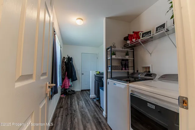 a view of a storage and utility room