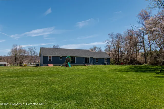 a house view with a garden space