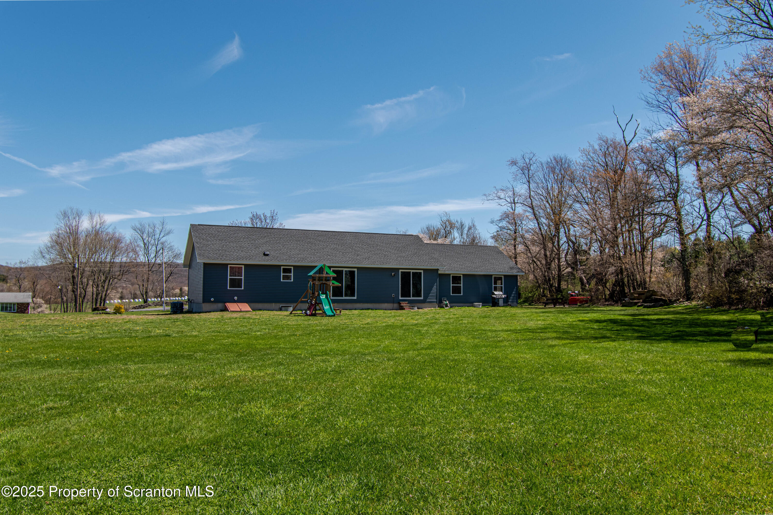 151 Sandy Banks Road Carbondale, PA 18407 - Photo 36 of 36 a house view with a garden space