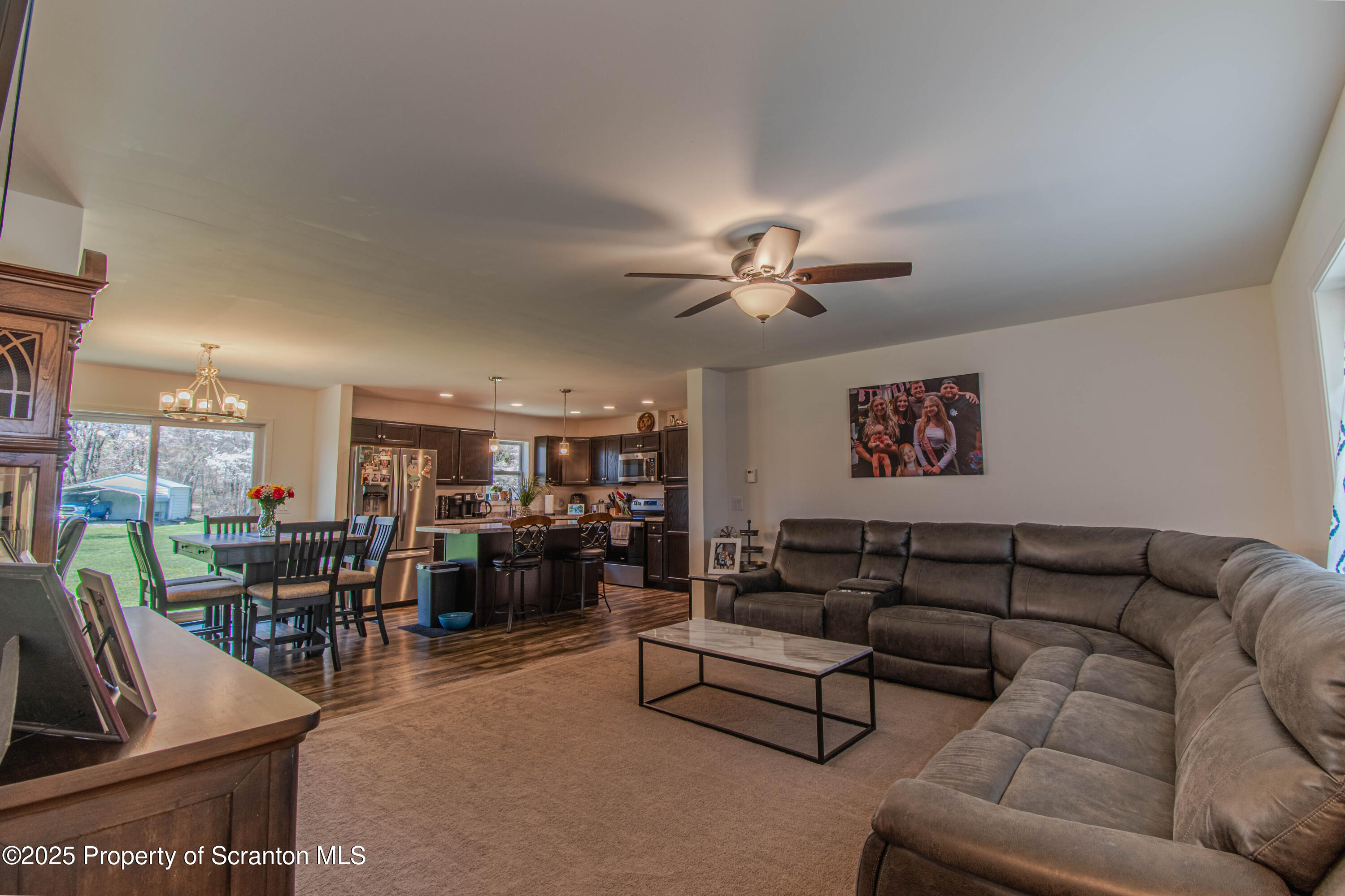 151 Sandy Banks Road Carbondale, PA 18407 - Photo 4 of 36 a living room with furniture kitchen view and a large window