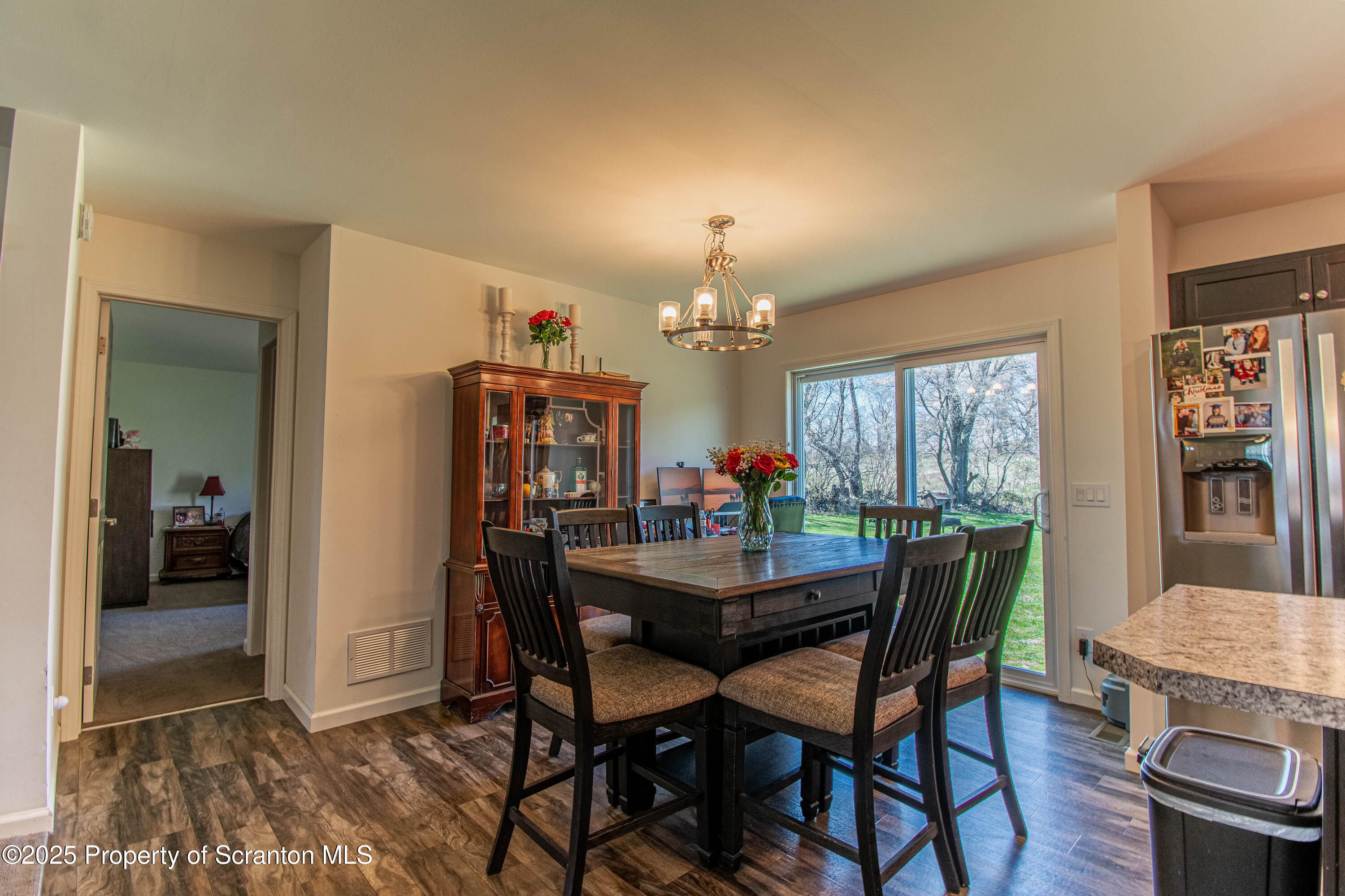 151 Sandy Banks Road Carbondale, PA 18407 - Photo 7 of 36 a view of a dining room with furniture and window
