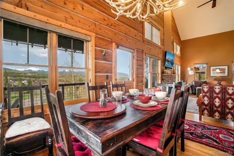 a outdoor space with furniture and view of city