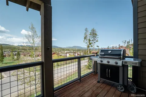 a view of a balcony with chairs