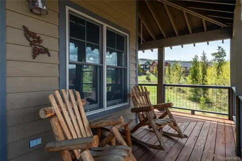 a view of a chairs and table in the patio